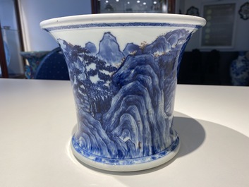 A fine Chinese blue, white and copper red 'Master of the Rocks' brush pot, Kangxi